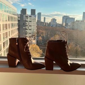Pointed brown leather chunky heeled boots in size 7 women’s.
